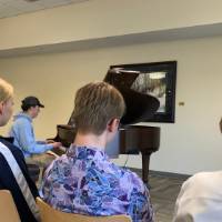 SAGE President performing